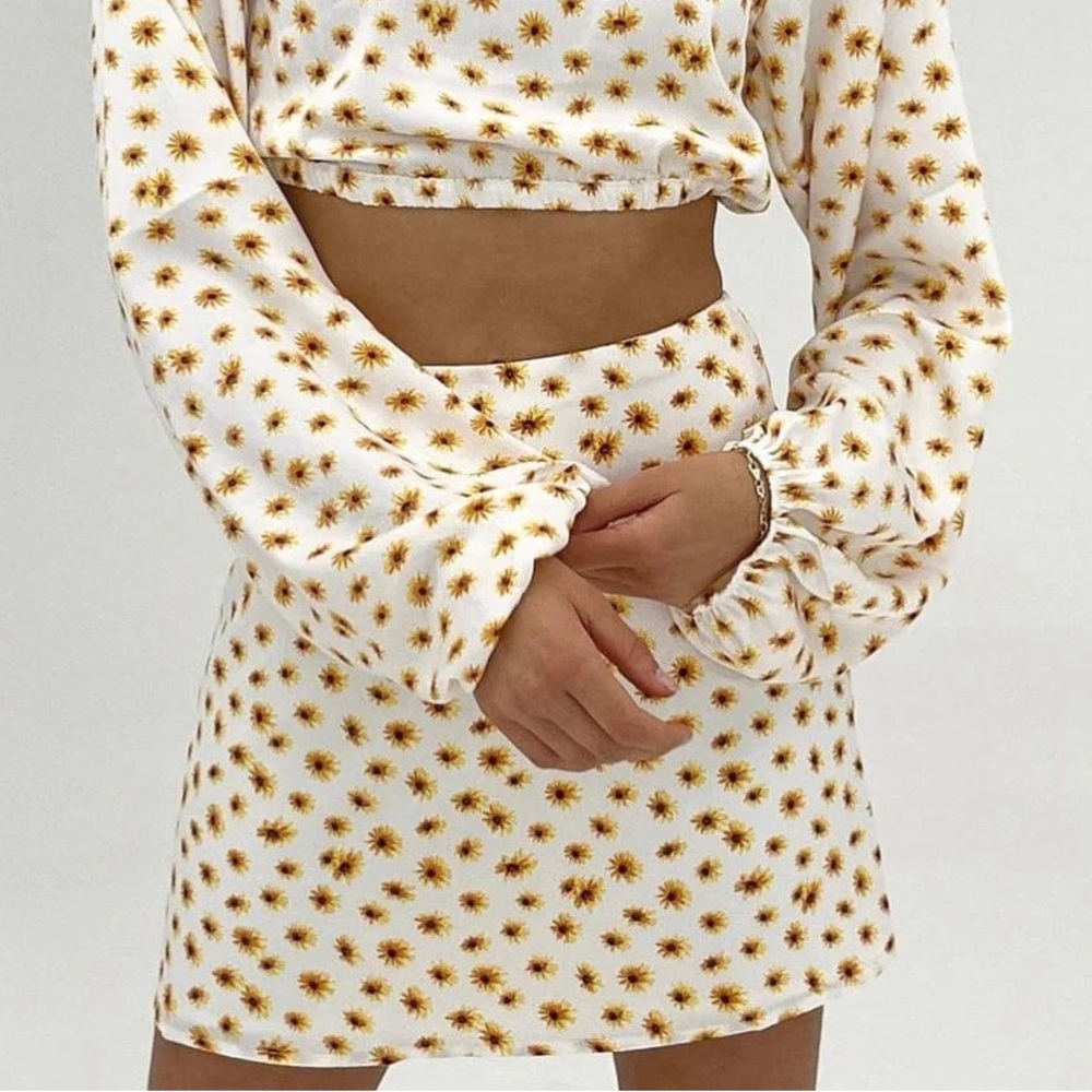NWT | WE WORE WHAT
Satin Mini Slip Skirt
Ivory Floral